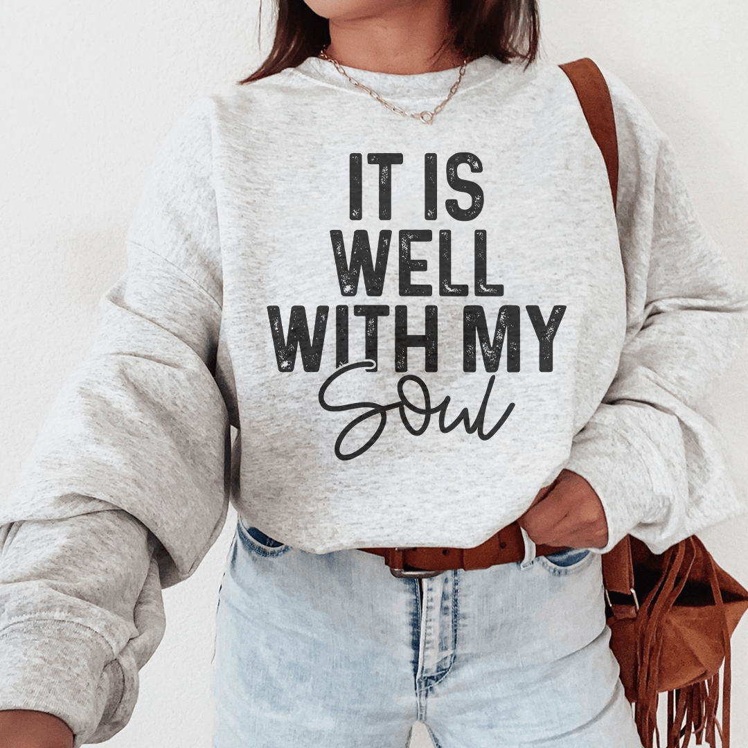 Cozy 'It Is Well With My Soul' sweats featuring a fleece lining and adjustable cuffs, designed by top artists.