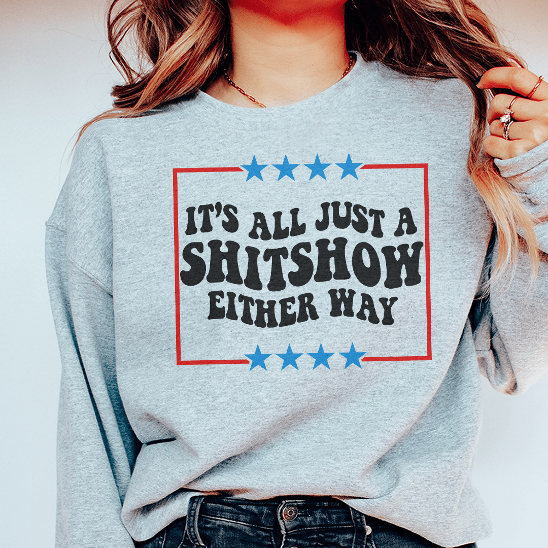 Cozy 'Its All Just A Shitshow Either Way' sweats featuring unique designs by top artists, made from a soft cotton/poly fleece blend.