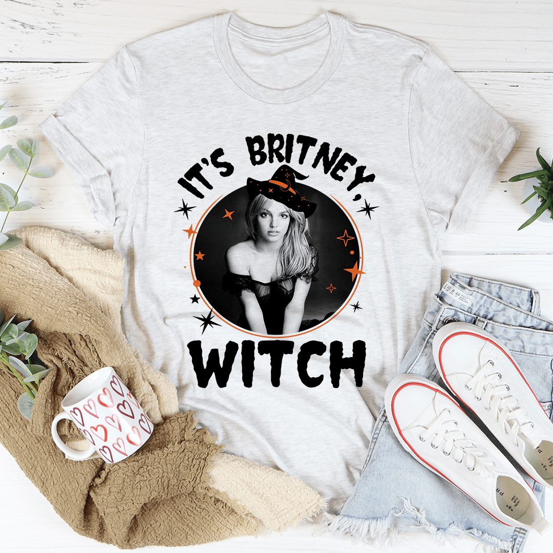 A stylish black t-shirt featuring the phrase 'It's Britney Witch' in bold lettering, made from soft ring-spun cotton.