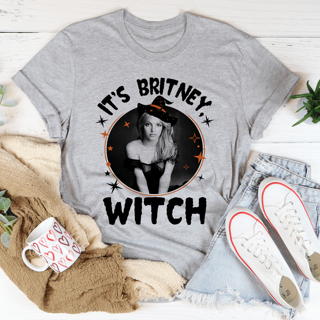 A stylish black t-shirt featuring the phrase 'It's Britney Witch' in bold lettering, made from soft ring-spun cotton.