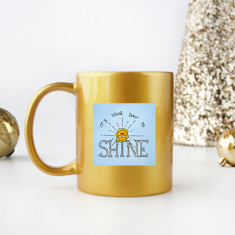 Elegant gold and silver ceramic mug with a stylish design, perfect for special occasions.