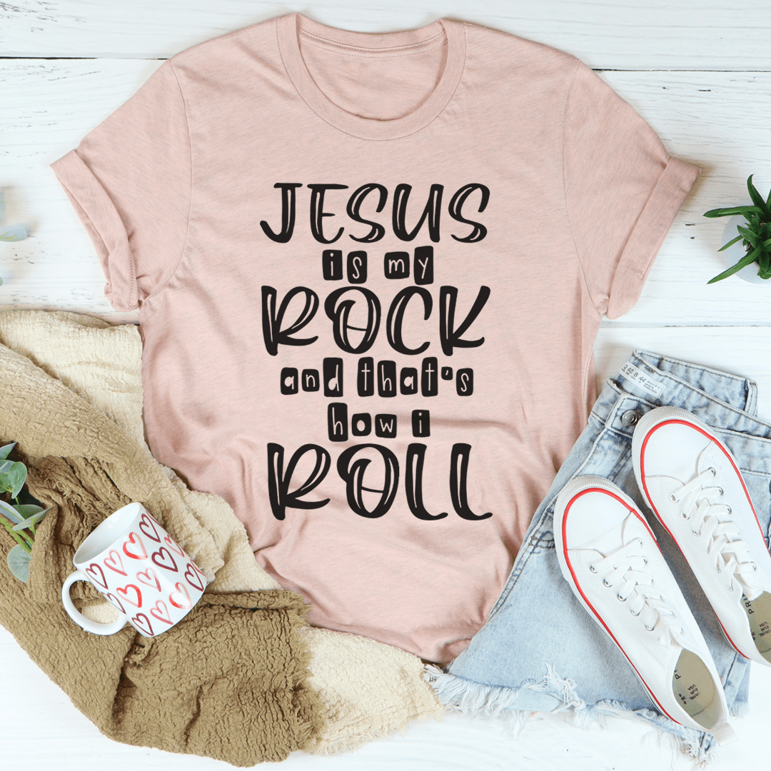 A comfortable Jesus Is My Rock And That's How I Roll Tee made of soft ring-spun cotton, featuring a durable design with double stitching.