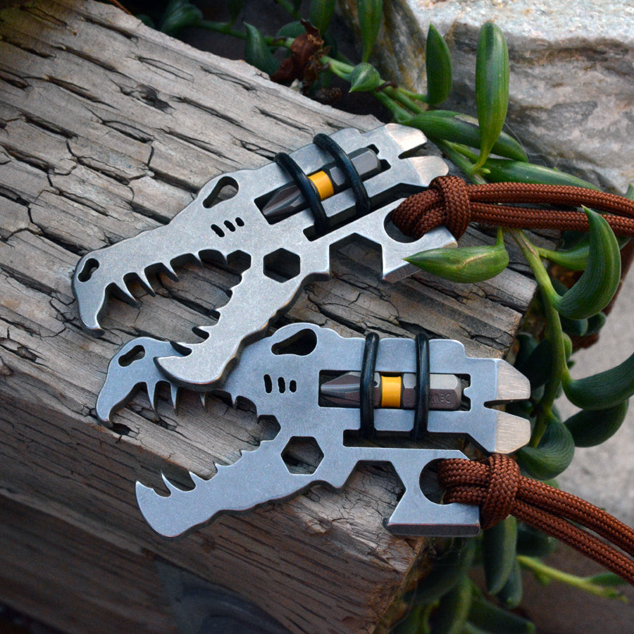 Jurassic Croc Multi-Tool featuring a dinosaur design with multiple functions including a bottle opener and pry bar.