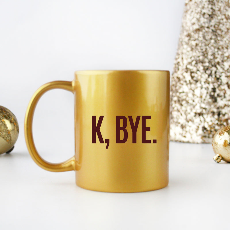 K Bye Gold & Silver Mug with elegant metallic finish, showcasing its ceramic design and stylish appearance.