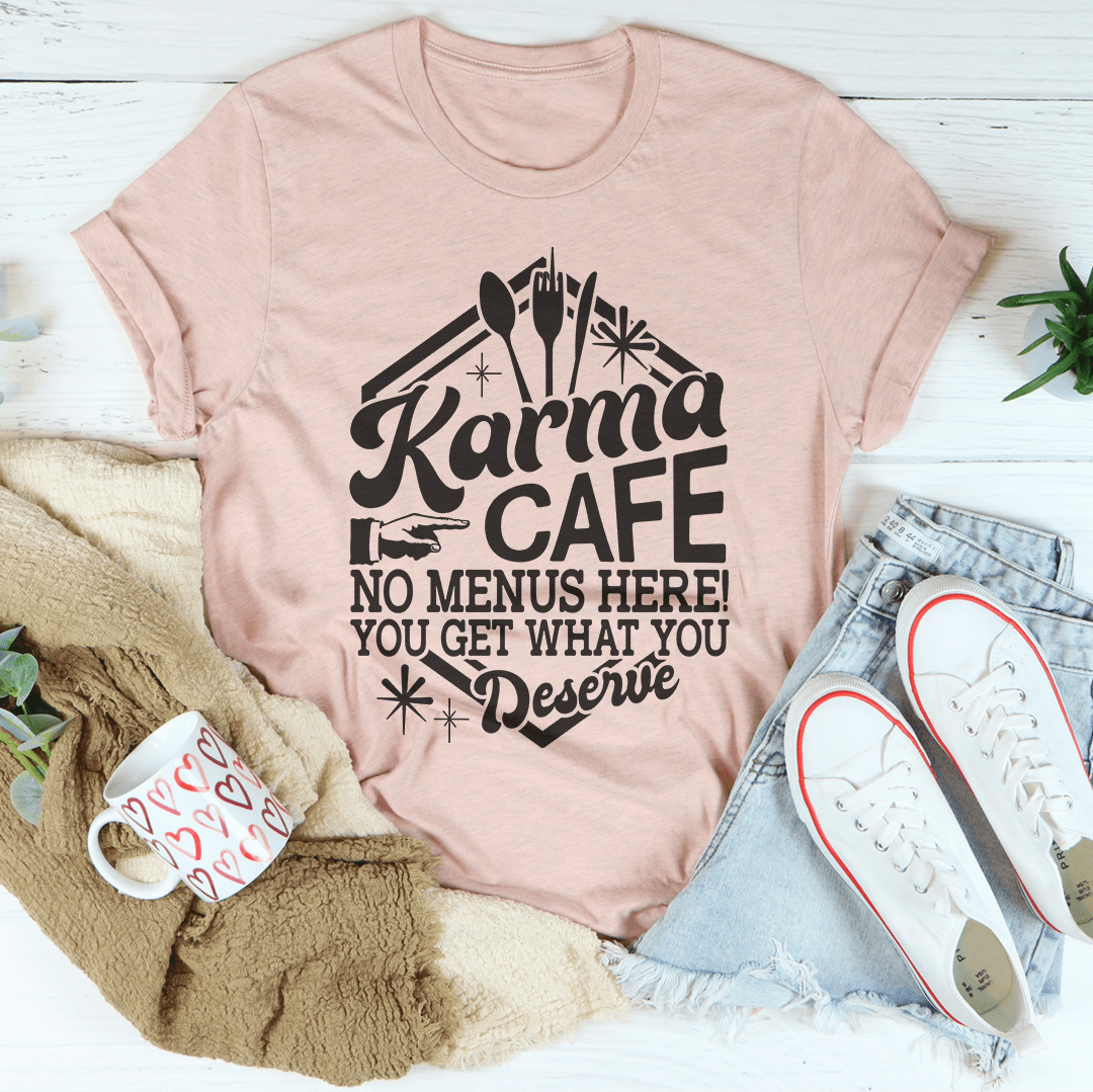 Karma Cafe T-Shirt in various colors, showcasing its soft cotton fabric and stylish design.