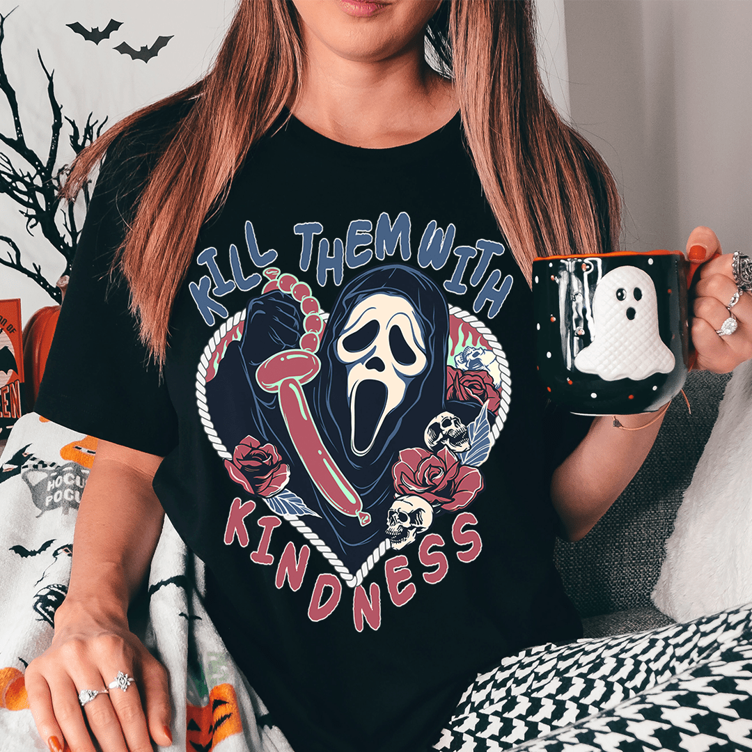 A black Halloween t-shirt featuring the phrase 'Kill Them With Kindness' in vibrant colors, made from soft cotton with double stitching.