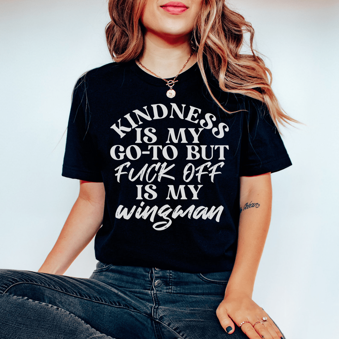 A soft and durable Kindness Is My Go-To Tee in various colors, showcasing its comfortable fit and stylish design.