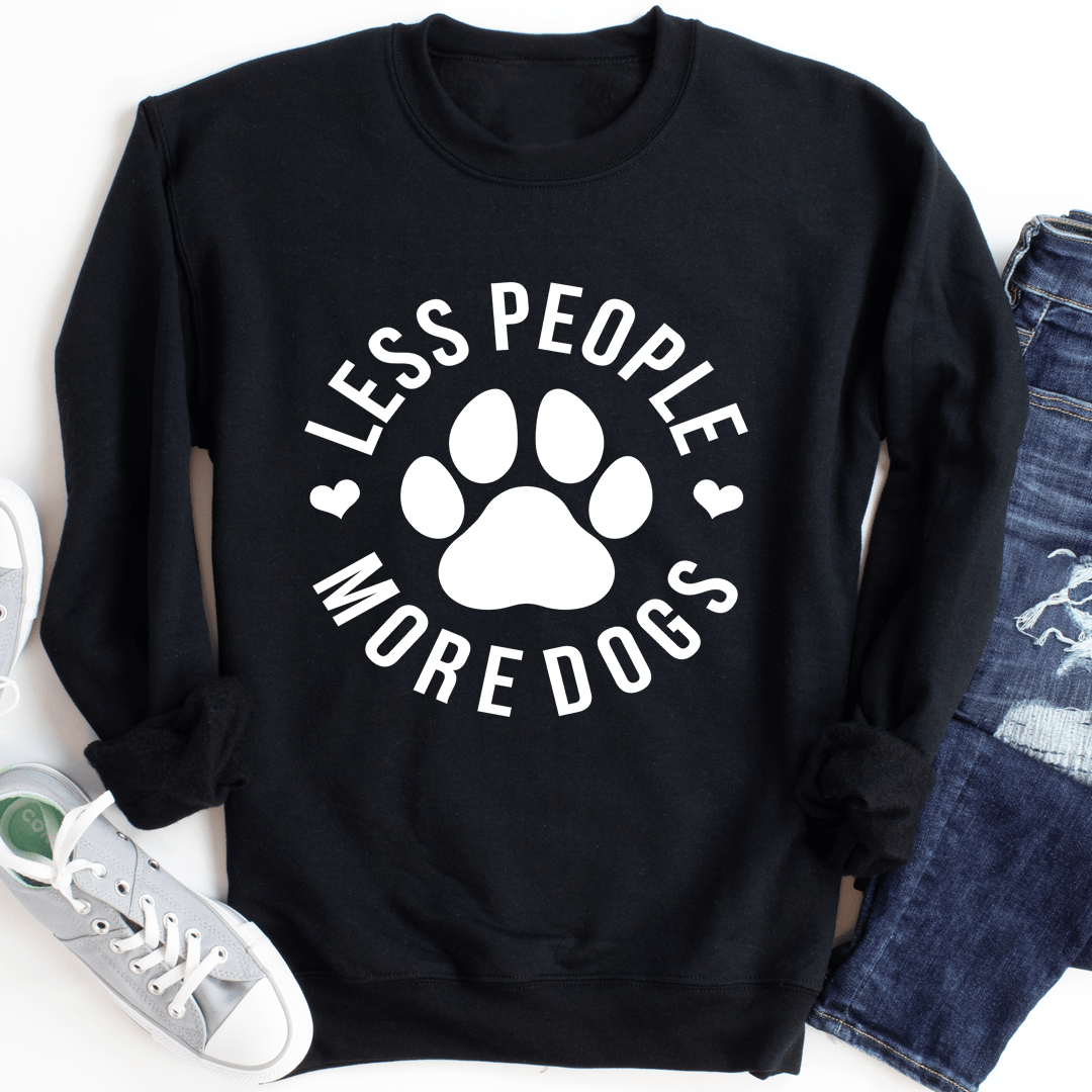 A cozy 'Less People More Dogs' sweatshirt featuring a stylish design, perfect for dog lovers.