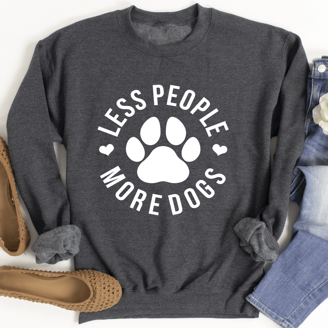 A cozy 'Less People More Dogs' sweatshirt featuring a stylish design, perfect for dog lovers.