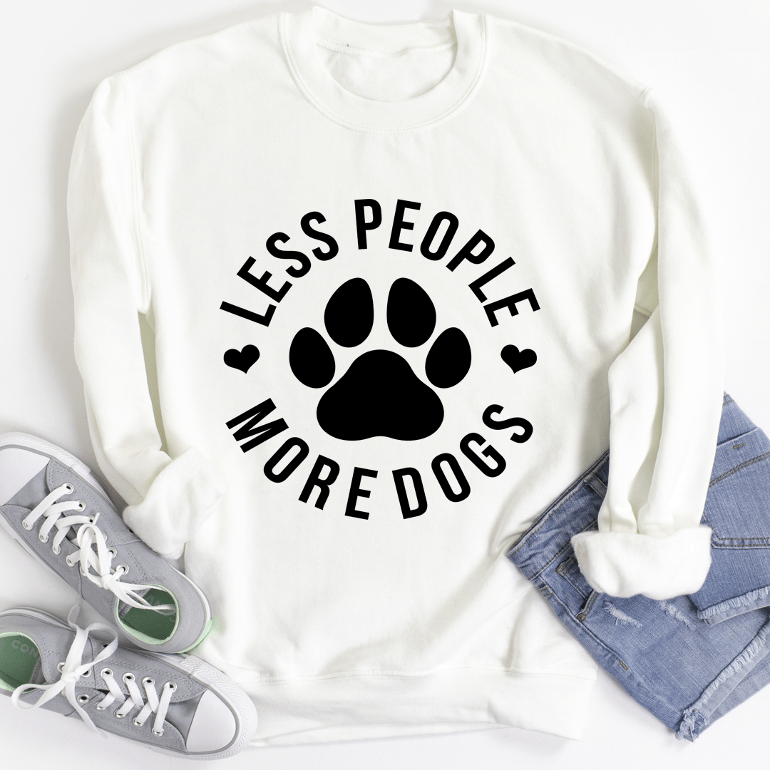 A cozy 'Less People More Dogs' sweatshirt featuring a stylish design, perfect for dog lovers.