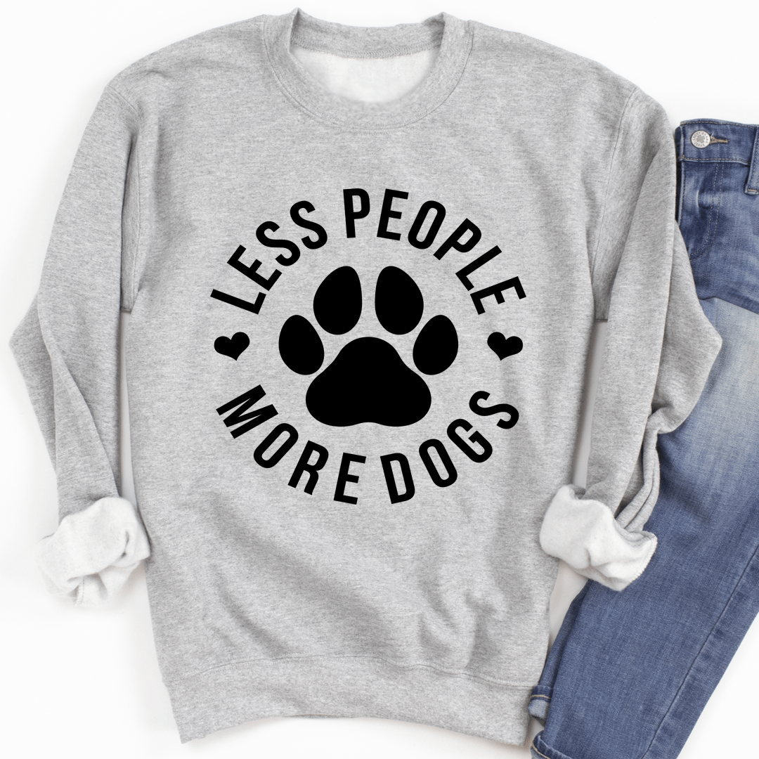 A cozy 'Less People More Dogs' sweatshirt featuring a stylish design, perfect for dog lovers.