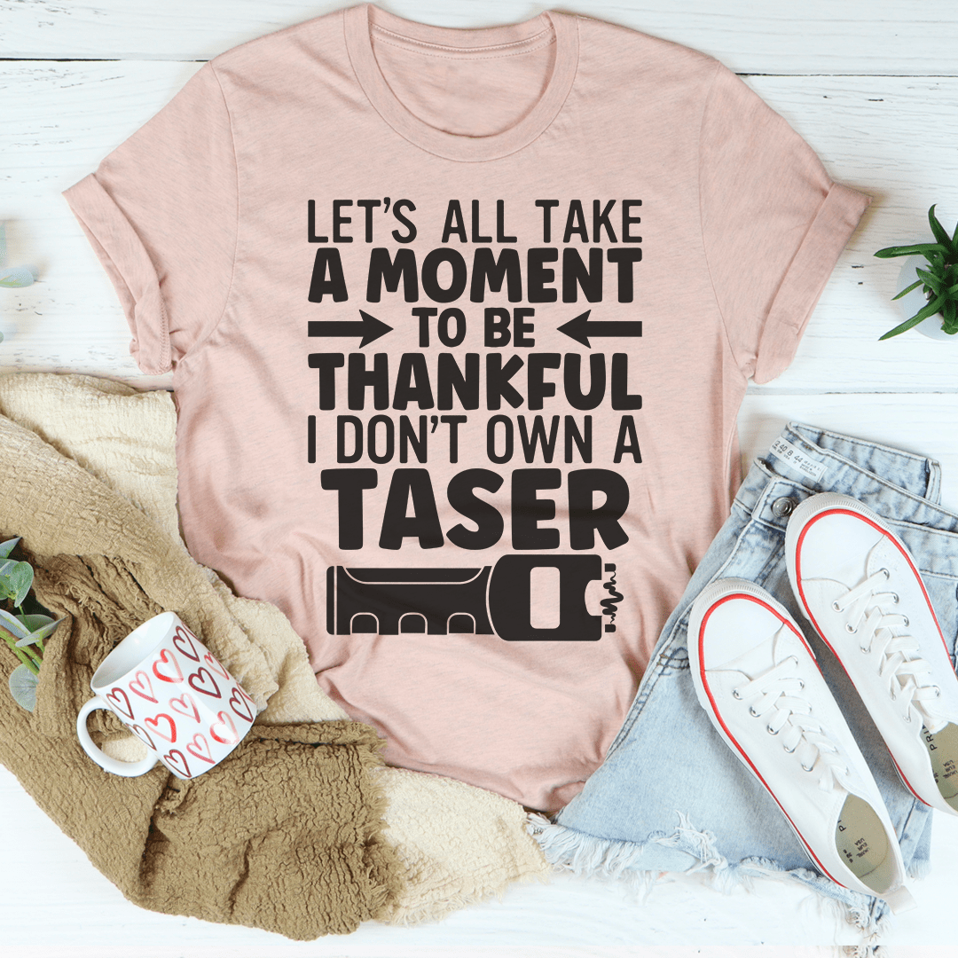 A comfortable and stylish 'Let's All Take A Moment To Be Thankful' T-Shirt made from soft ring-spun cotton, featuring double stitching for durability.