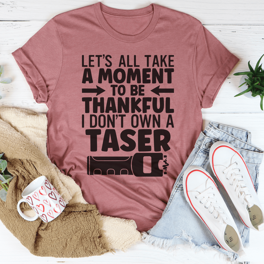 A comfortable and stylish 'Let's All Take A Moment To Be Thankful' T-Shirt made from soft ring-spun cotton, featuring double stitching for durability.