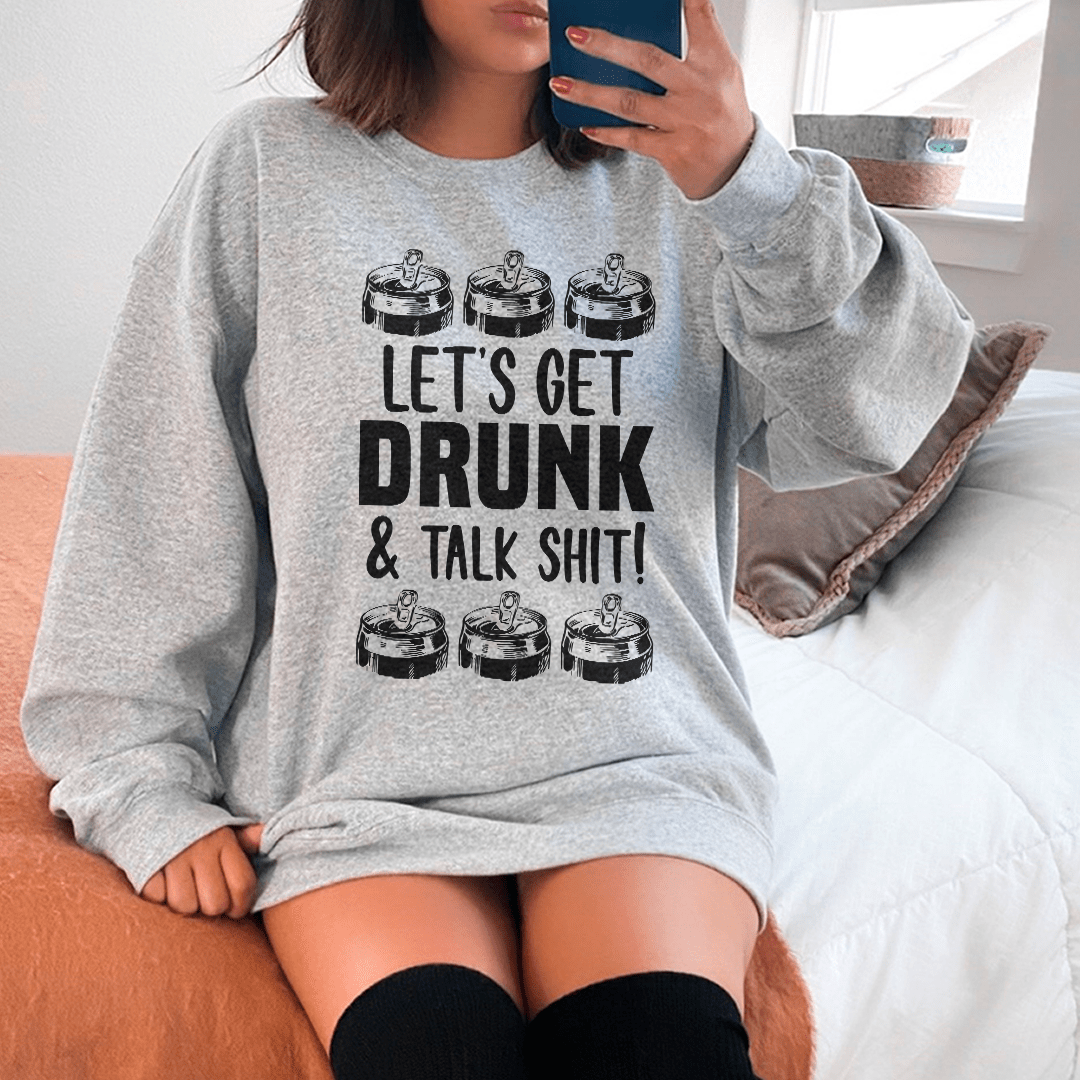 A cozy pair of 'Let's get Drunk' sweats featuring a unique design by top artists, made from a soft cotton/poly fleece blend.