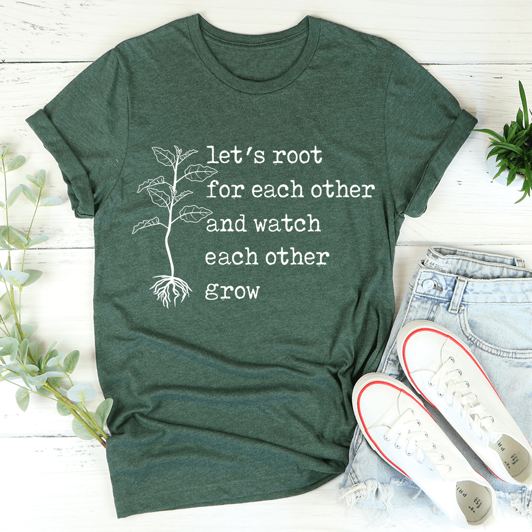 A soft, durable Let's Root For Each Other T-Shirt in various colors, featuring double stitching and a positive message.