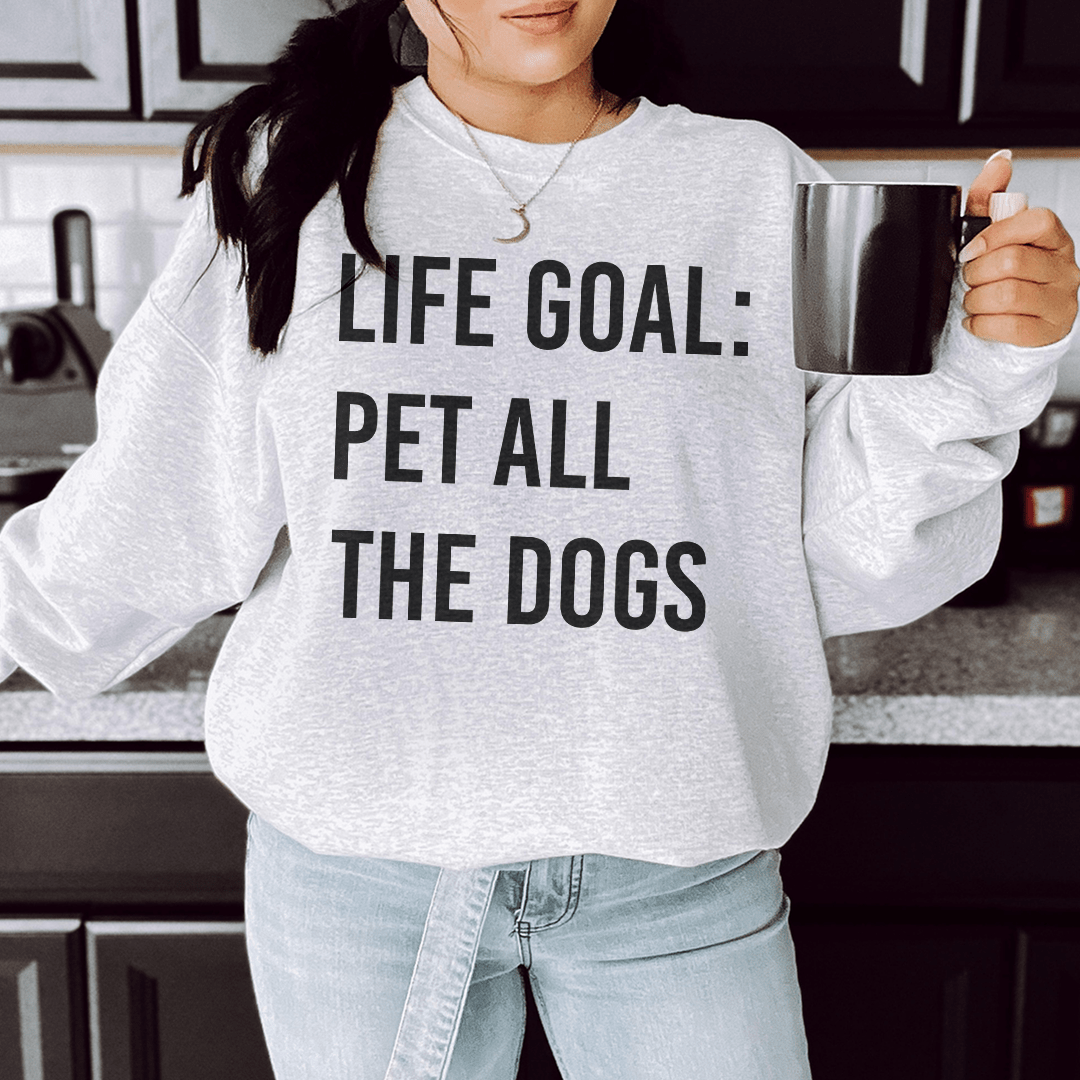 Cozy sweatshirt featuring the phrase 'Life Goal Pet All The Dogs', designed for dog lovers, made from soft cotton/poly fleece blend.