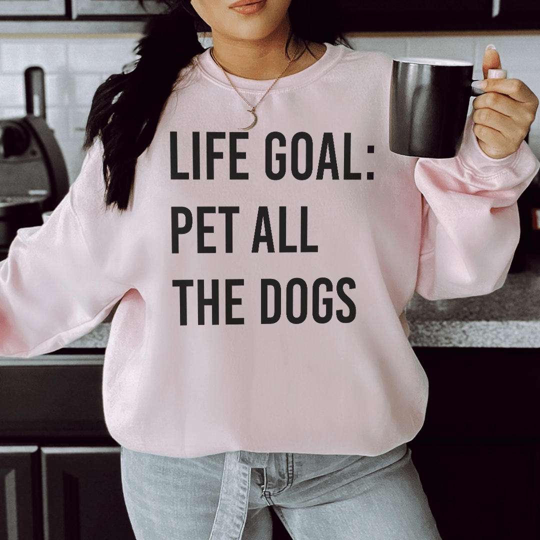 Cozy sweatshirt featuring the phrase 'Life Goal Pet All The Dogs', designed for dog lovers, made from soft cotton/poly fleece blend.