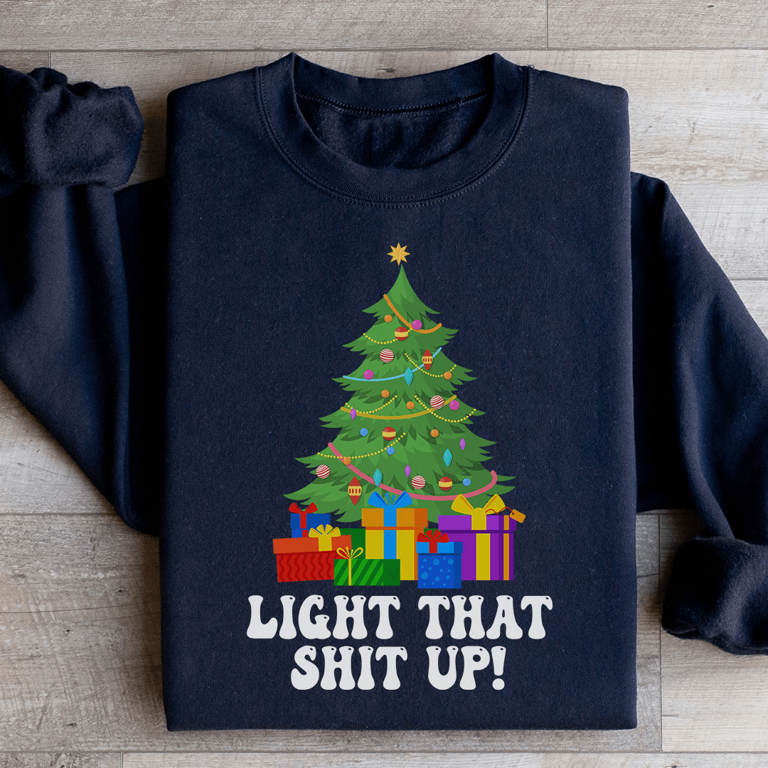 Cozy Light That Up Christmas Tree hoodie featuring a vibrant Christmas tree design, perfect for holiday celebrations.