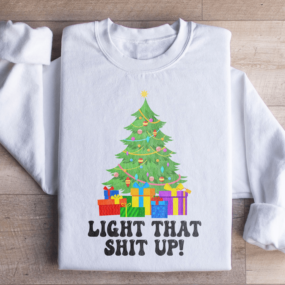 Cozy Light That Up Christmas Tree hoodie featuring a vibrant Christmas tree design, perfect for holiday celebrations.