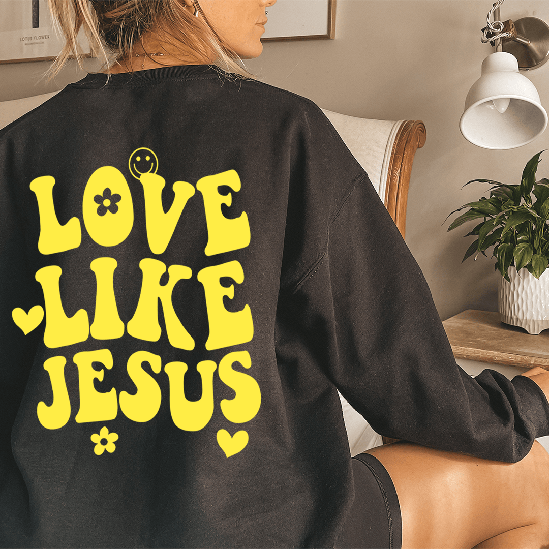 Love Like Jesus sweatshirt featuring a cozy fleece lining and adjustable cuffs, designed for comfort and style.