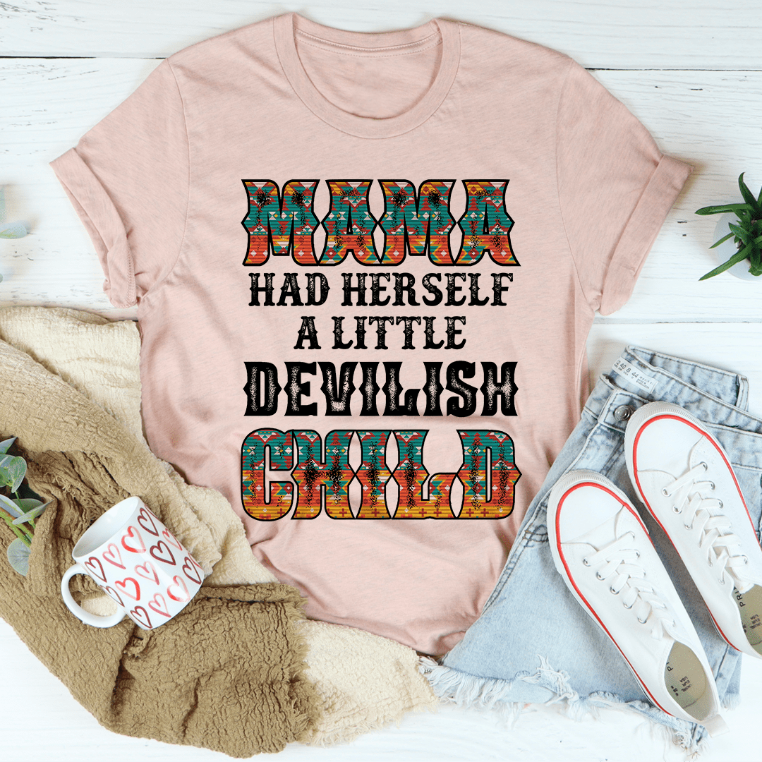 Mama Had Herself A Little Devilish Child Tee featuring playful text on a soft cotton fabric.