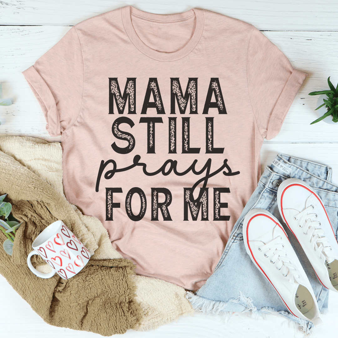 Mama Still Prays For Me T-Shirt in soft cotton, featuring a heartfelt design and durable stitching.