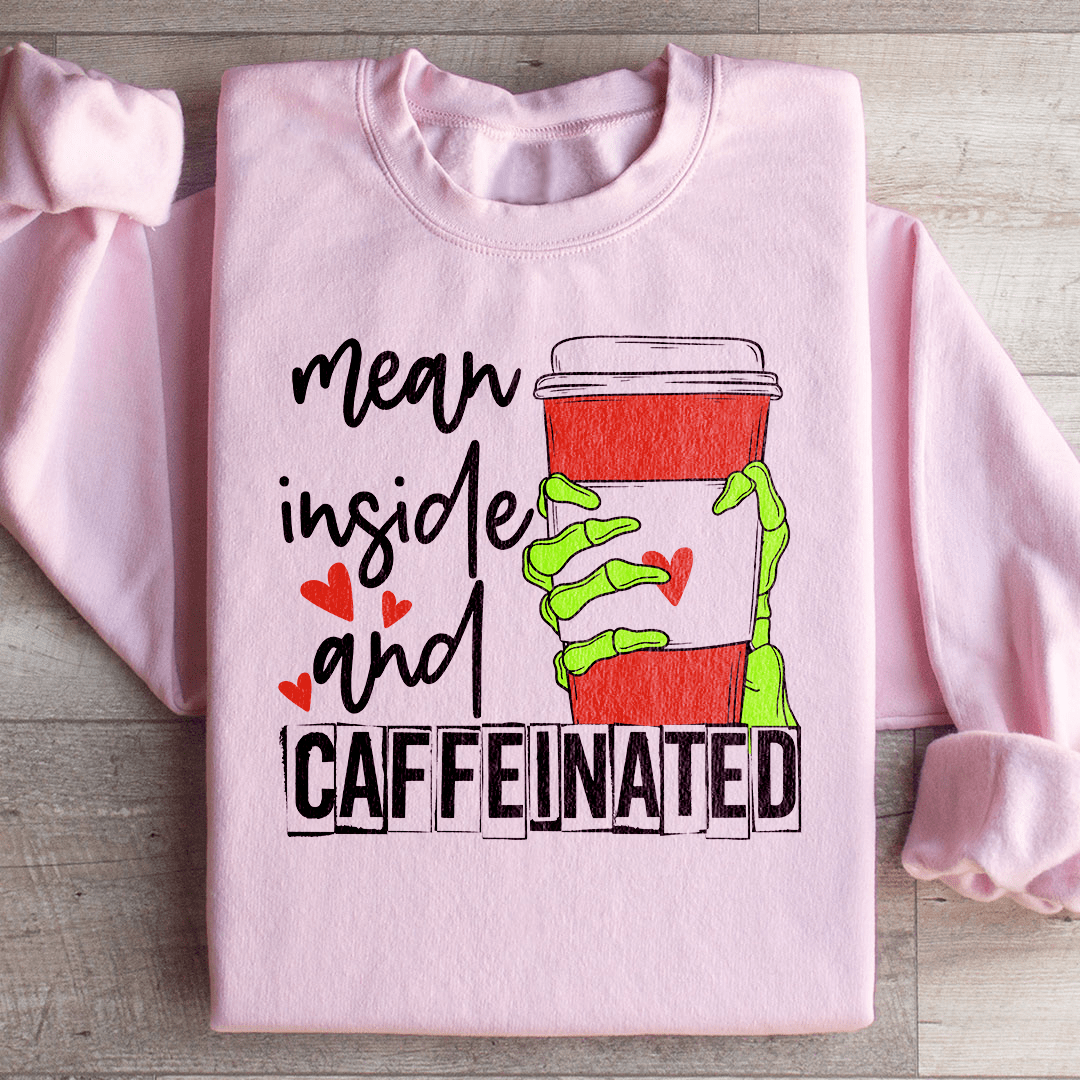 Mean Inside And Caffeinated Sweatshirt featuring a cozy fleece lining and adjustable cuffs, designed for comfort and style.