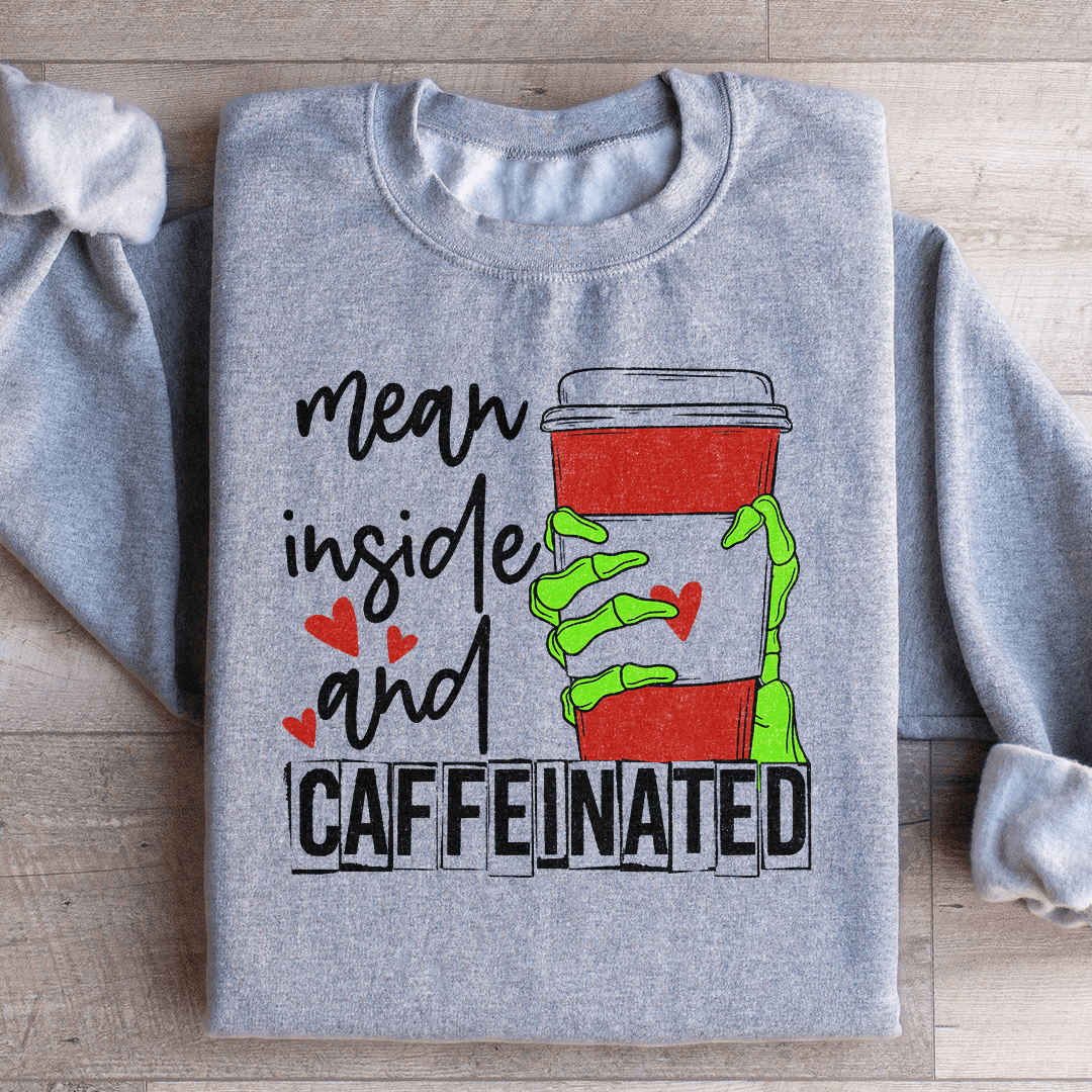 Mean Inside And Caffeinated Sweatshirt featuring a cozy fleece lining and adjustable cuffs, designed for comfort and style.