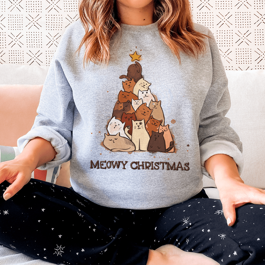 Cozy Meowy Christmas sweatshirt featuring a festive cat design, perfect for holiday celebrations.