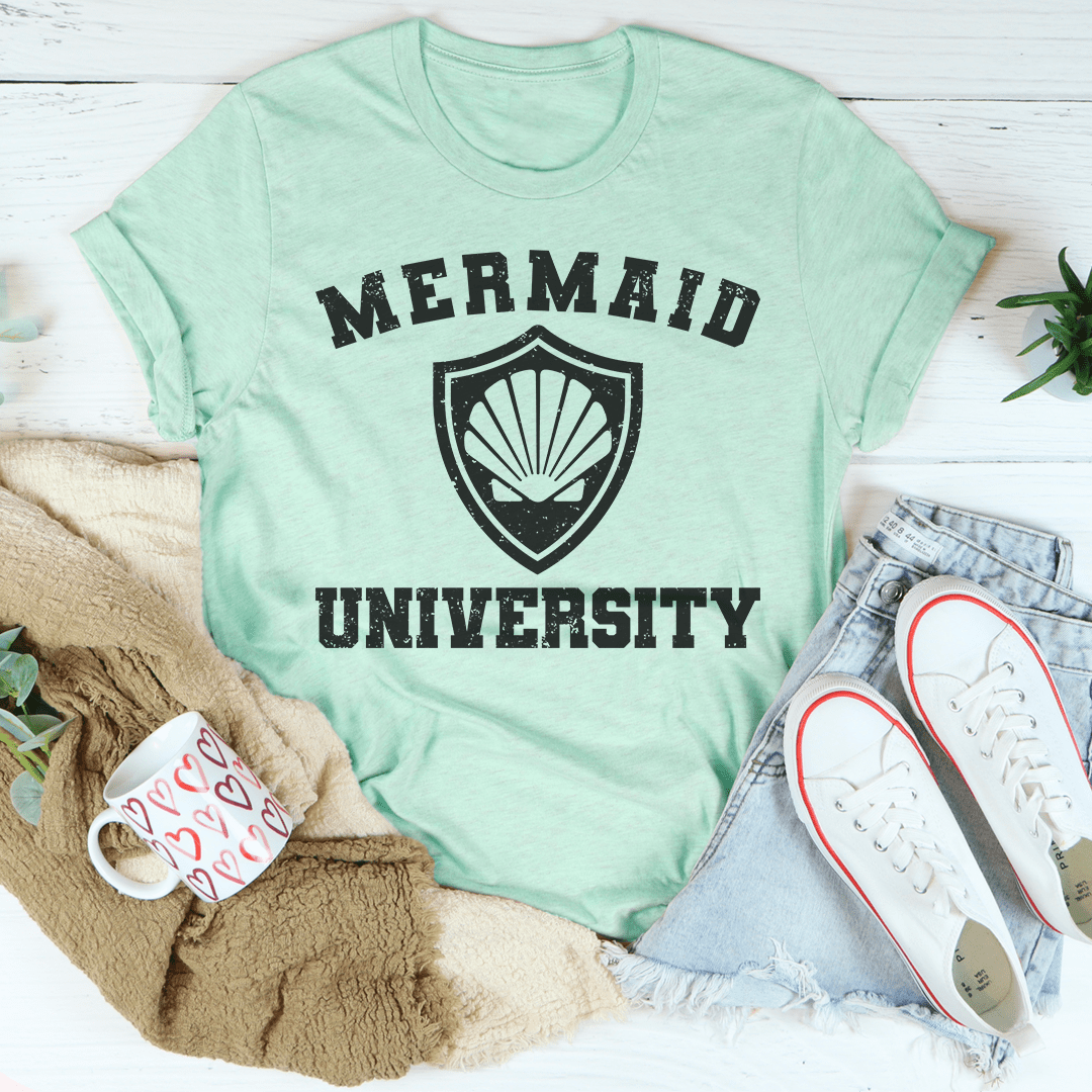 A stylish Mermaid University Tee made from soft ring-spun cotton, featuring double stitching for durability and vibrant DTG printed design.