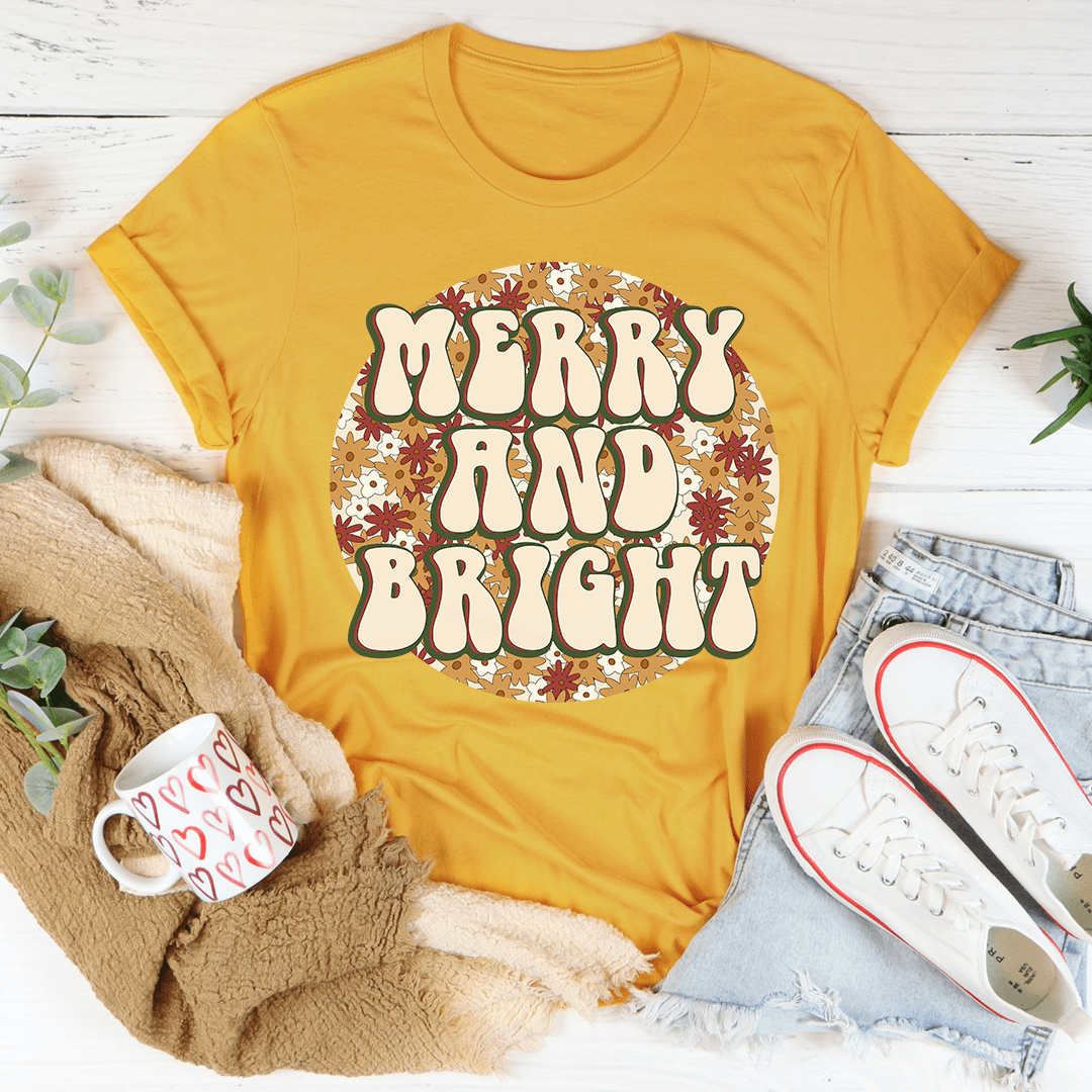 Merry And Bright Tee showcasing its soft cotton fabric and durable stitching, available in various sizes.