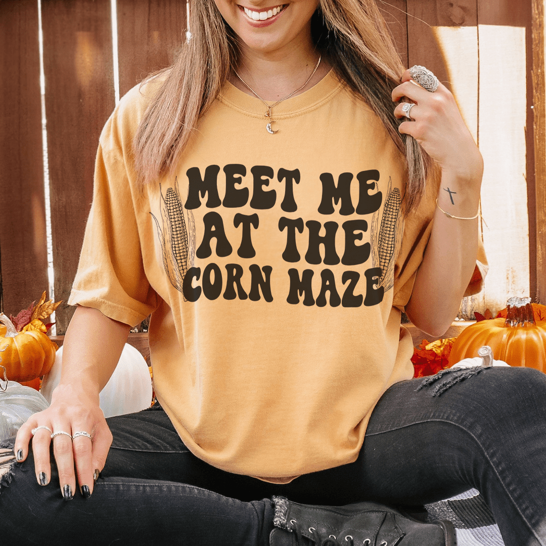 A stylish Meet Me At The Corn Maze Tee made from soft ring-spun cotton, featuring double stitching for durability and vibrant DTG printing.