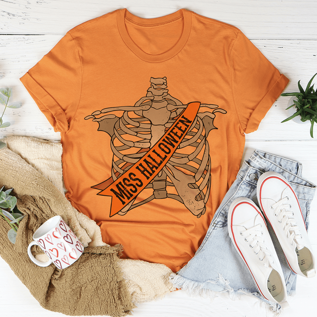 A stylish Miss Halloween Tee made from soft ring-spun cotton, featuring a festive Halloween design, perfect for celebrating the spooky season.