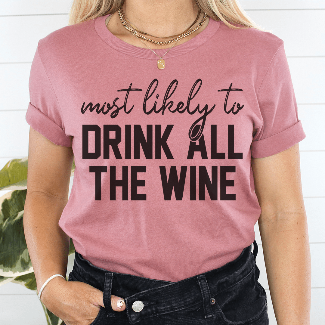 A comfortable Thanksgiving t-shirt featuring the phrase 'Most Likely To Drink All The Wine', made from soft cotton with double stitching.