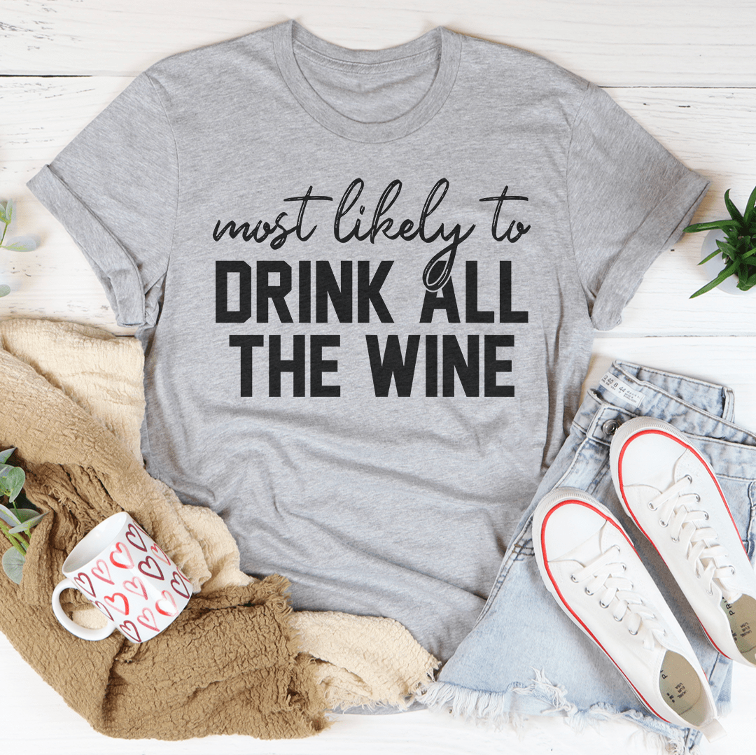 A comfortable Thanksgiving t-shirt featuring the phrase 'Most Likely To Drink All The Wine', made from soft cotton with double stitching.