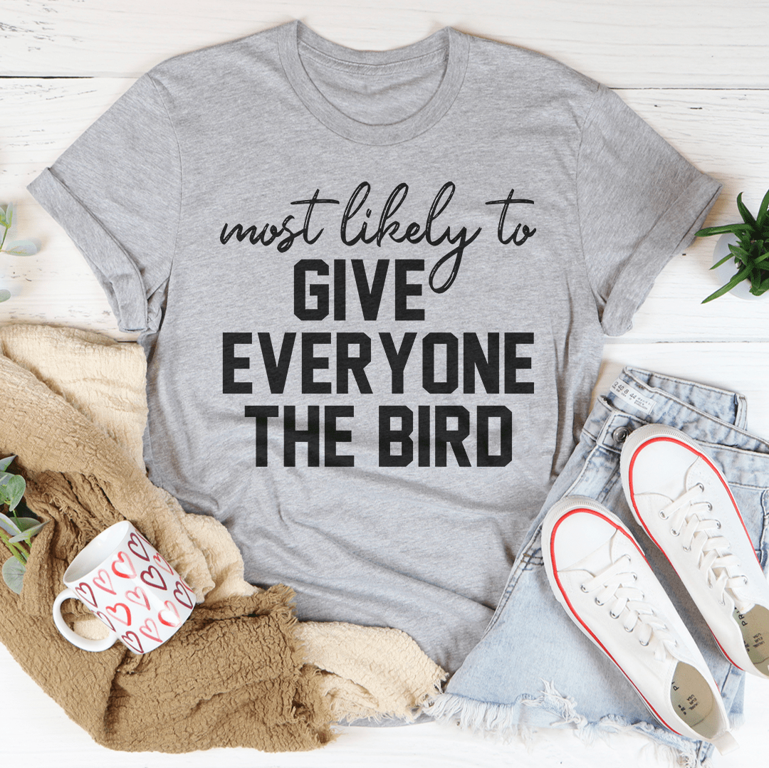 A humorous Thanksgiving t-shirt featuring the phrase 'Most Likely To Give Everyone The Bird', made from soft cotton with double stitching.