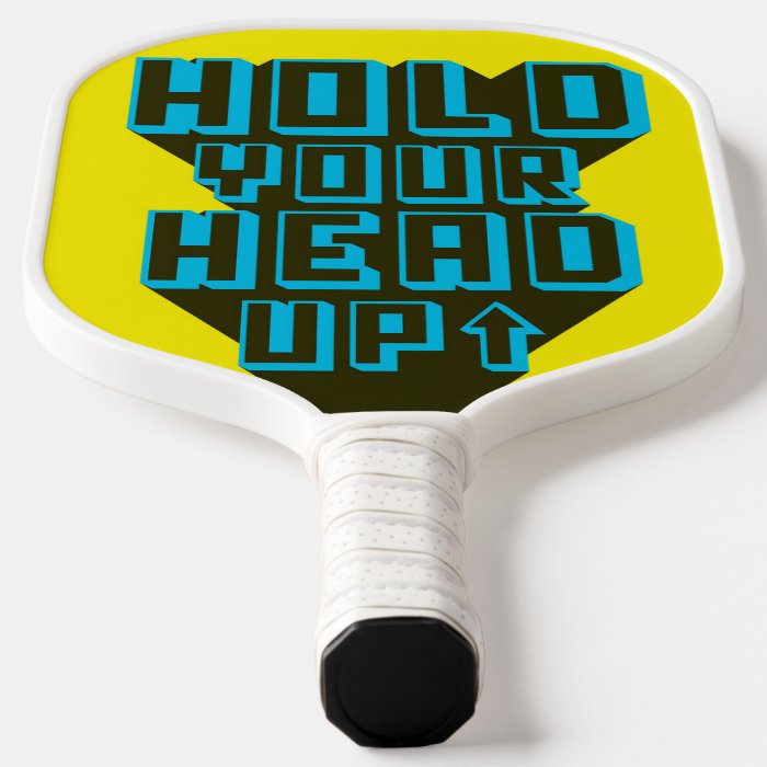 Motivational Quote Pickleball Paddle featuring a durable fiberglass surface and comfortable faux-leather grip, designed for optimal performance.