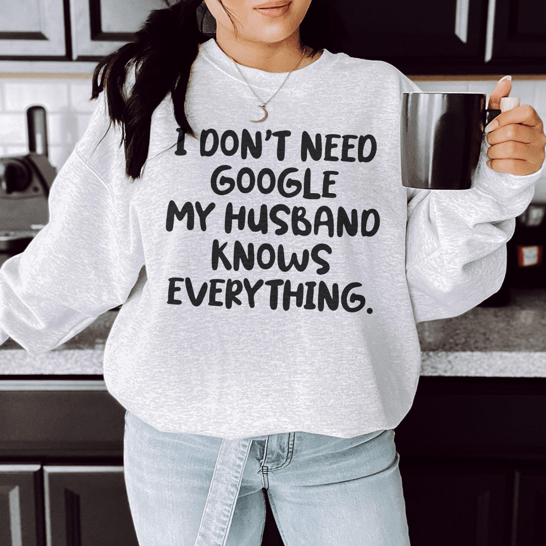 Cozy 'My Husband Knows Everything' hoodie featuring a fleece lining and adjustable cuffs, perfect for casual wear.