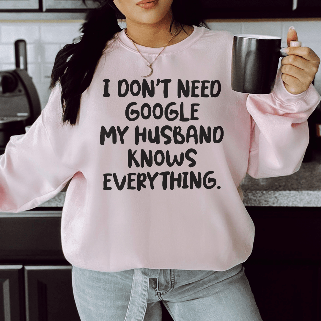 Cozy 'My Husband Knows Everything' hoodie featuring a fleece lining and adjustable cuffs, perfect for casual wear.