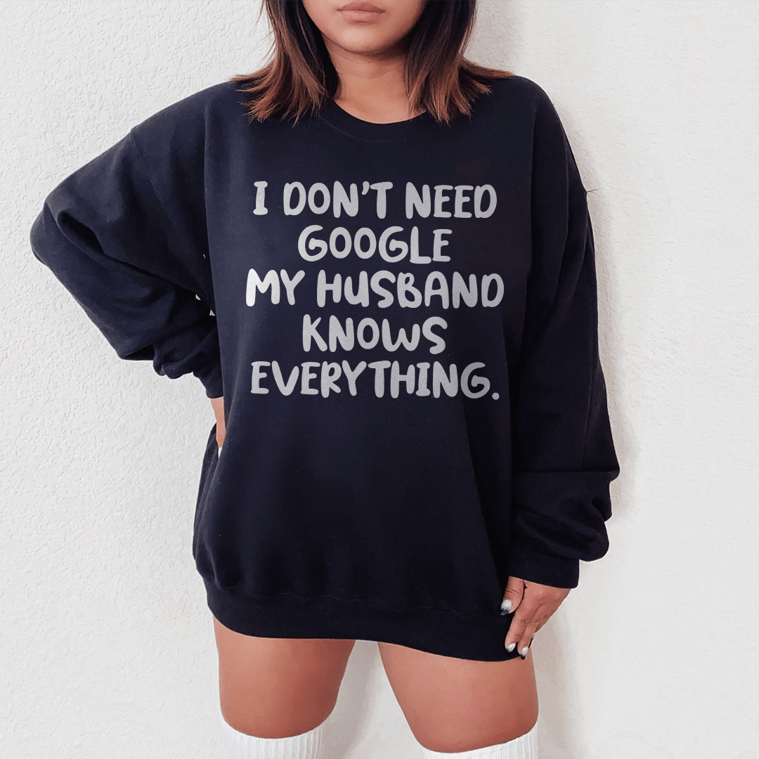 Cozy 'My Husband Knows Everything' hoodie featuring a fleece lining and adjustable cuffs, perfect for casual wear.