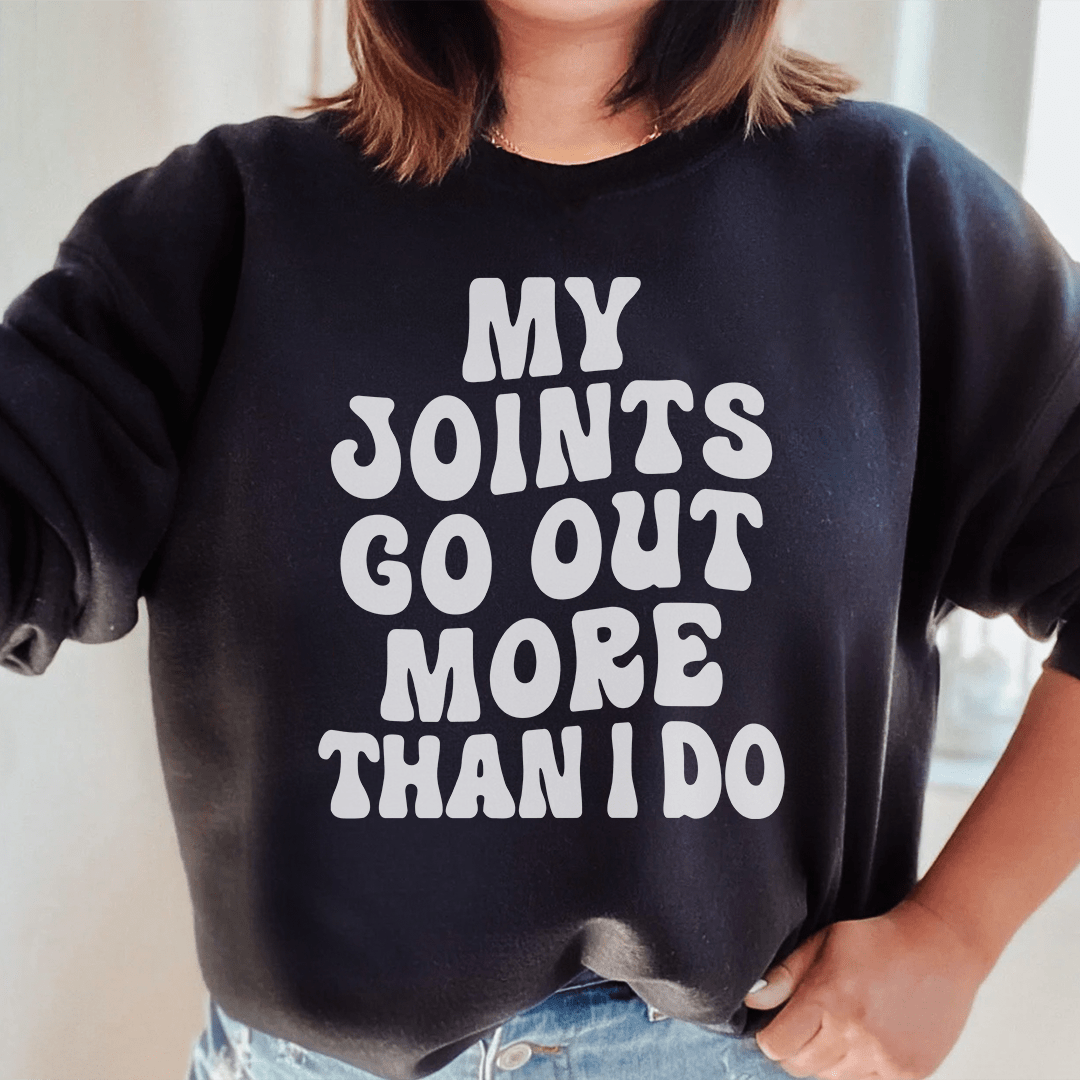 Cozy 'My Joints Go Out More Than I Do' sweats featuring unique designs by top artists, made from a warm cotton/poly fleece blend.