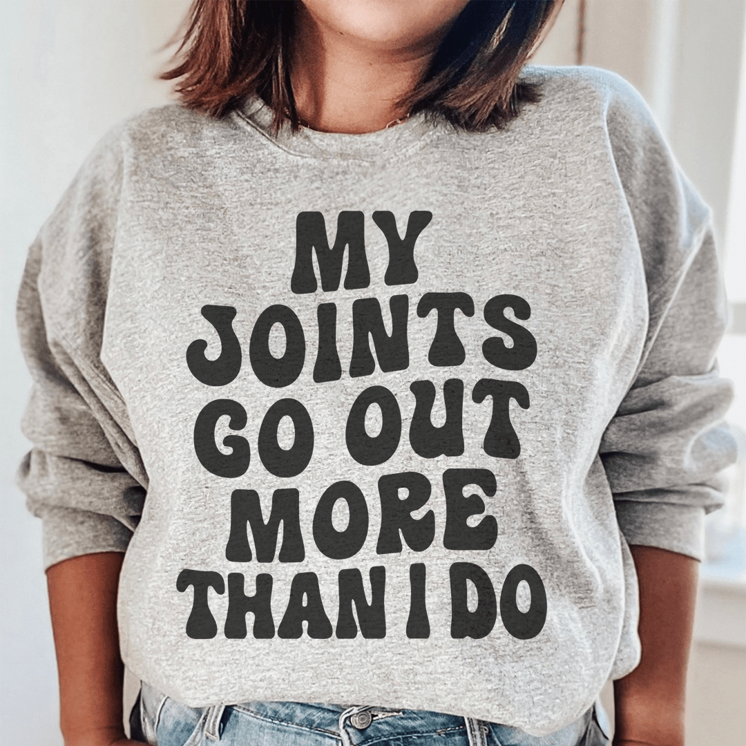 Cozy 'My Joints Go Out More Than I Do' sweats featuring unique designs by top artists, made from a warm cotton/poly fleece blend.