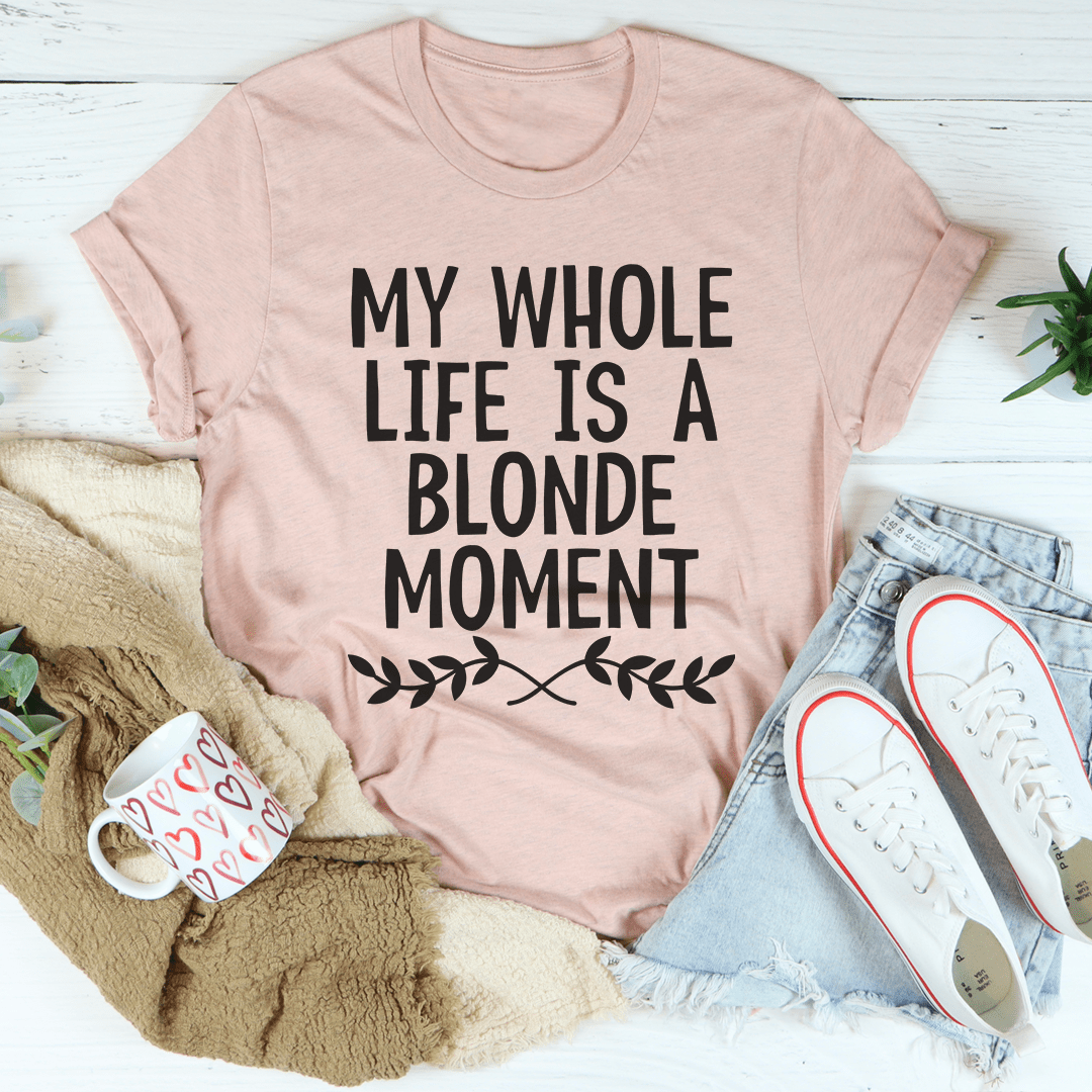 A stylish My Whole Life Is A Blonde Moment T-Shirt made from soft ring-spun cotton, featuring a humorous text print.