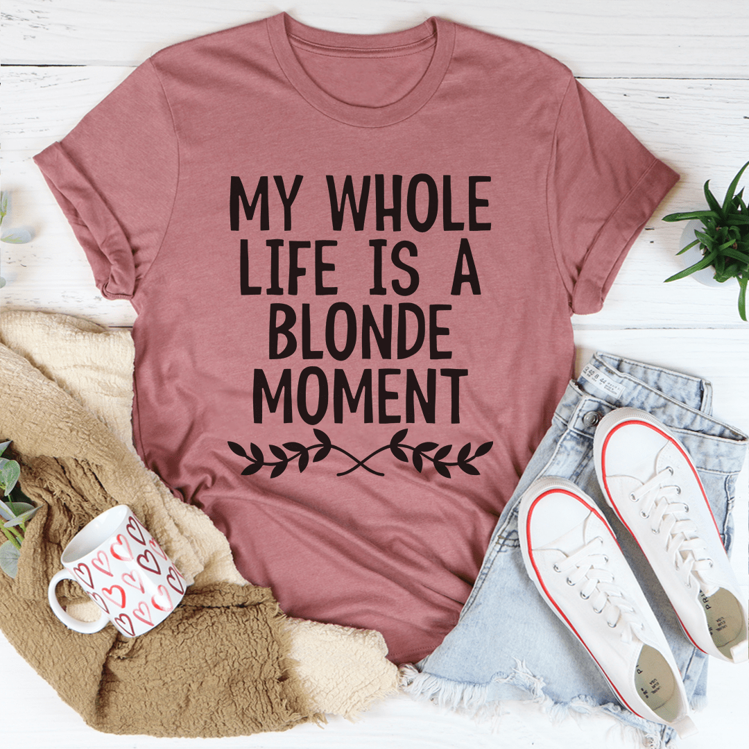 A stylish My Whole Life Is A Blonde Moment T-Shirt made from soft ring-spun cotton, featuring a humorous text print.