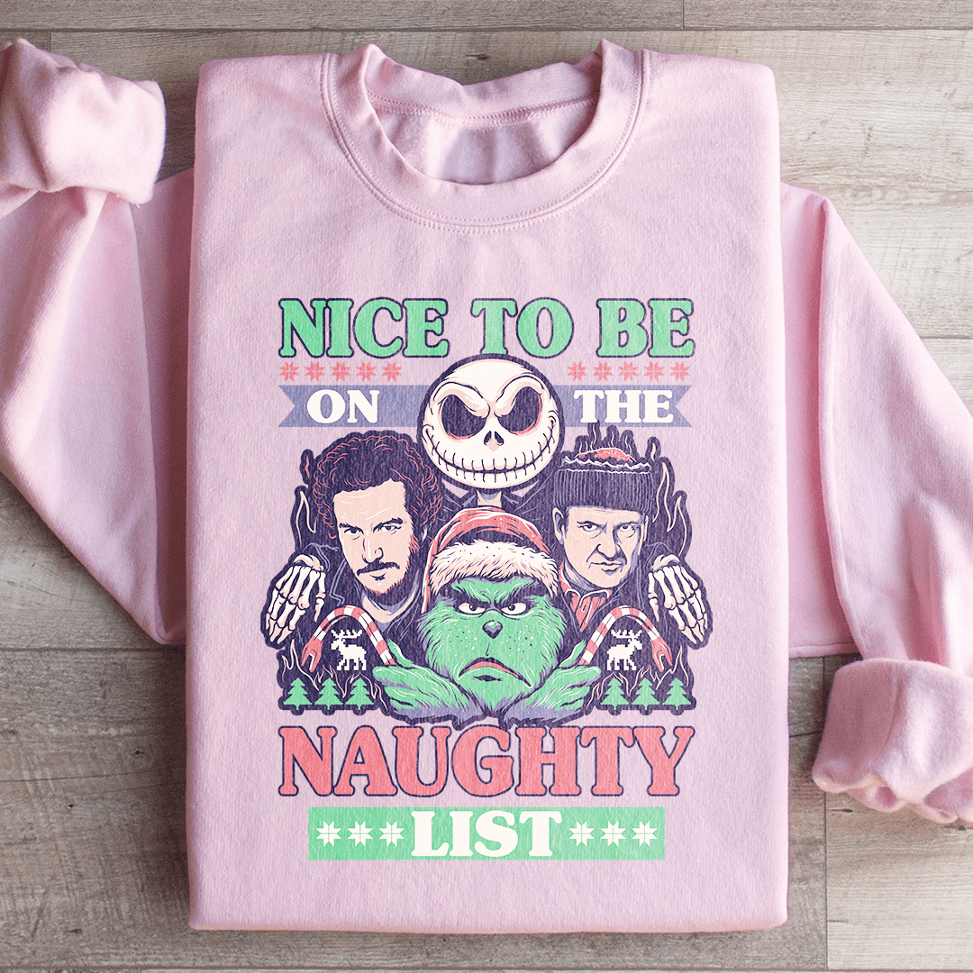 Cozy 'Nice To Be On The Naughty List' sweats featuring unique artistic designs, made from a warm cotton/poly fleece blend.