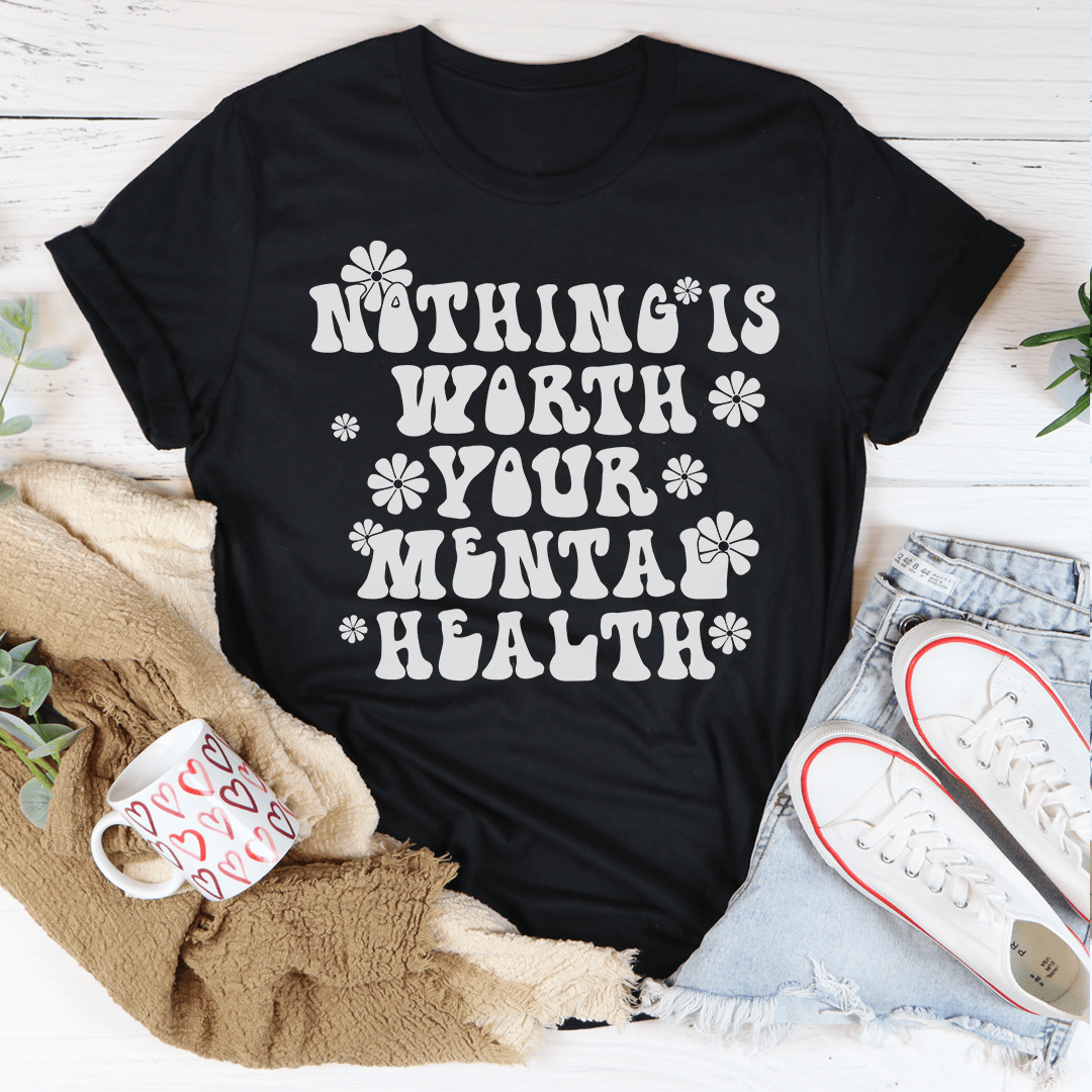 A comfortable and stylish t-shirt featuring the phrase 'Nothing Is Worth Your Mental Health', made from soft ring-spun cotton with durable stitching.