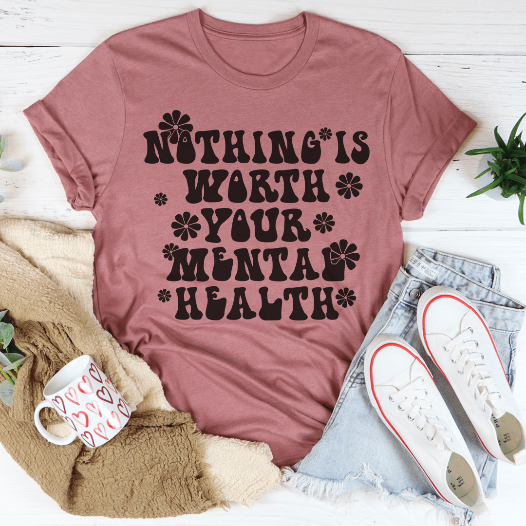 A comfortable and stylish t-shirt featuring the phrase 'Nothing Is Worth Your Mental Health', made from soft ring-spun cotton with durable stitching.