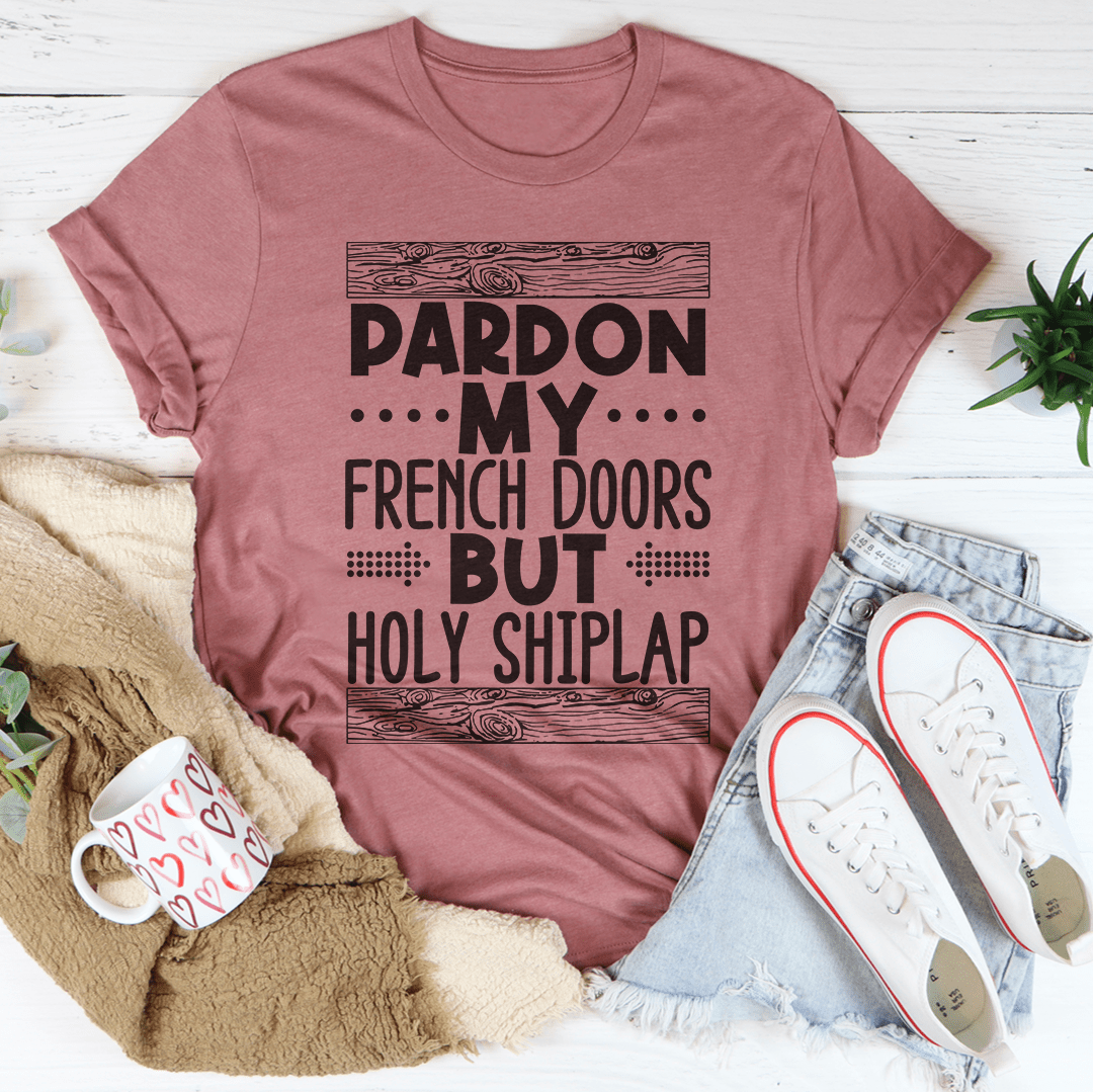 A stylish Pardon My French Doors But Holy Shiplap Tee made of soft ring-spun cotton, featuring a fun printed design.