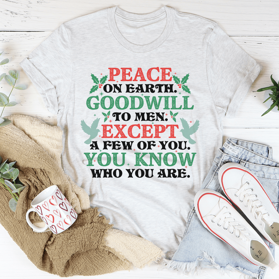 A soft, durable t-shirt featuring the phrase 'Peace On Earth Goodwill To Men', perfect for holiday celebrations.