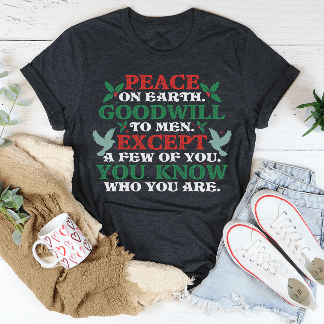 A soft, durable t-shirt featuring the phrase 'Peace On Earth Goodwill To Men', perfect for holiday celebrations.